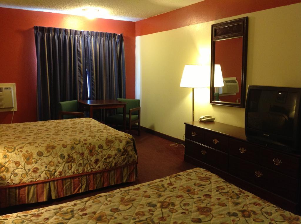 Scottish Inn And Suites Tomball Habitación foto
